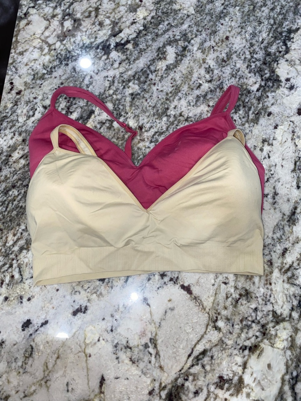 Set of two women’s Athleta sports bras- Orange & Berry